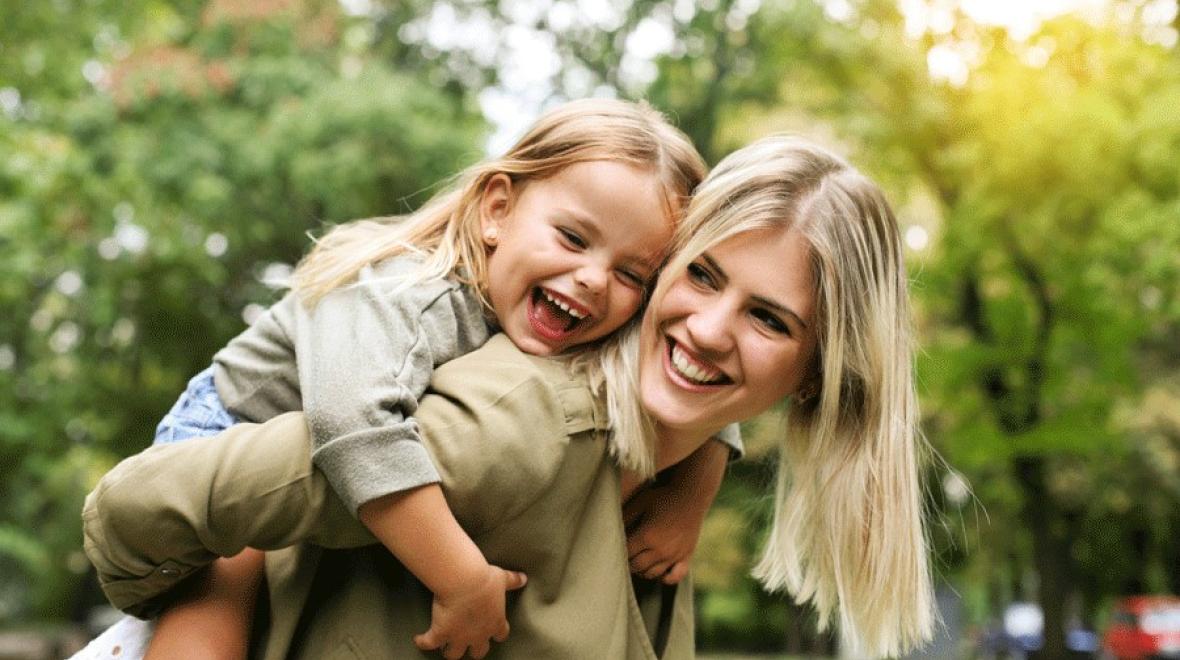 mother-child-smiling-outside-mothers-day-seattle-iStock-607601978_0