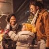 family shopping at an outdoor christmas holiday market_credit iStock-1087506082